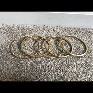 Five gold bangles